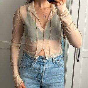 Sheer cream top